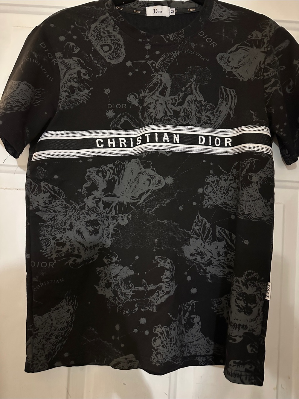 Christian Dior short-sleeve top featuring signature Zodiac motif print.